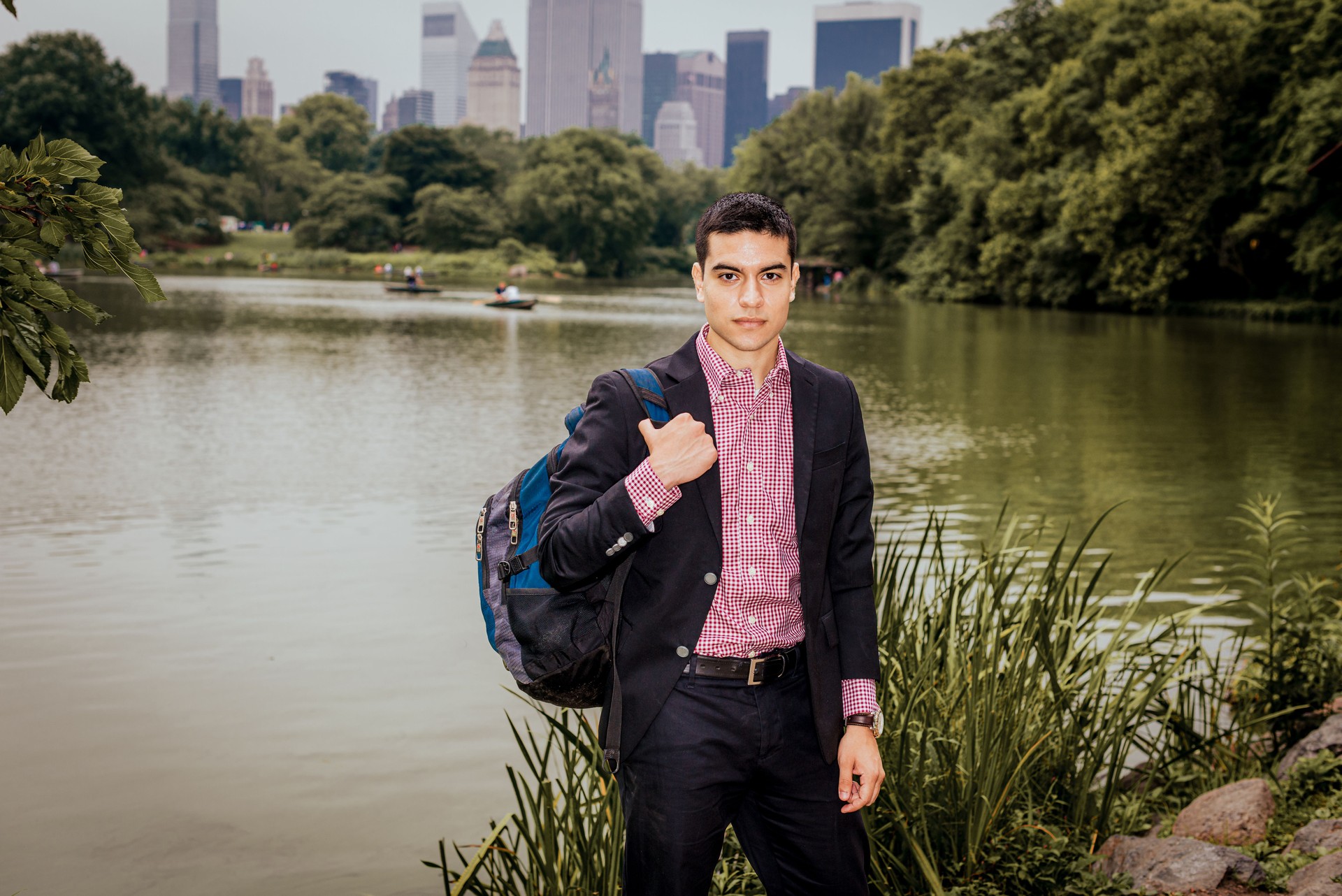 Young man standing by lake in New York City